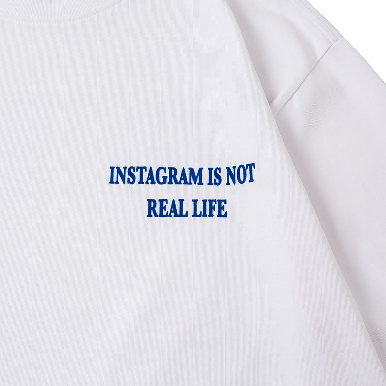 A[S]USL INSTAGRAM IS NOT REAL LIFE LONG TEE-WHITE