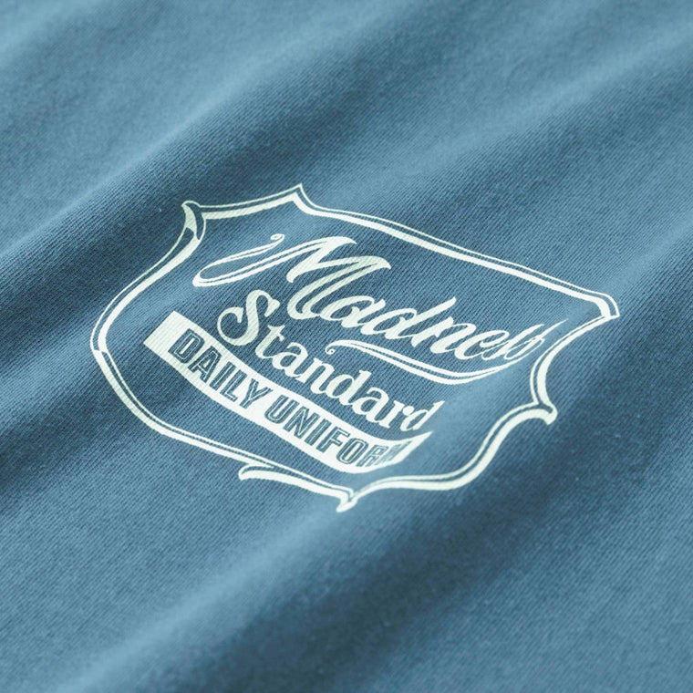 MADNESS BADGE (S) UNIFORM T-SHIRT-BLUE