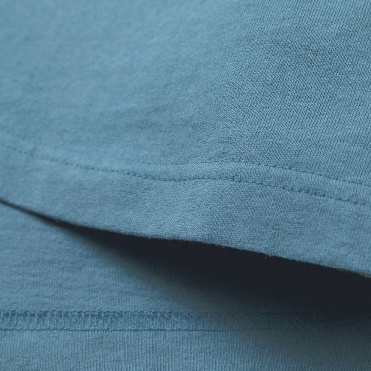 MADNESS BADGE (S) UNIFORM T-SHIRT-BLUE