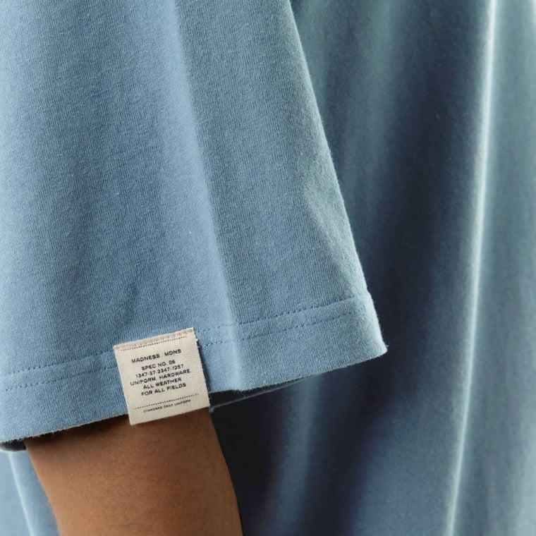 MADNESS BADGE (S) UNIFORM T-SHIRT-BLUE