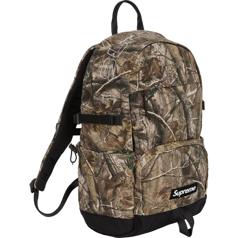 SUPREME DENIM BACKPACK-REALTREE®AP CAMO