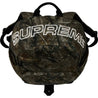 SUPREME DENIM BACKPACK-REALTREE®AP CAMO