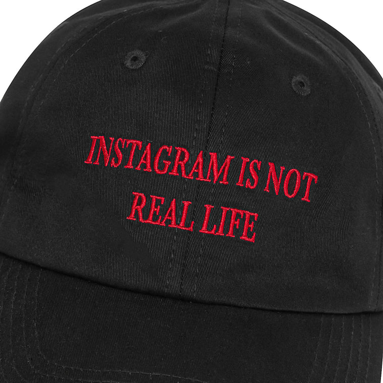A[S]USL INSTAGRAM IS NOT REAL LIFE DAD CAP-BLACK