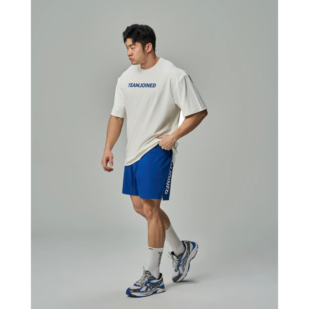 TEAMJOINED JOINED® ADAPT LOGO SPLICING PERFORMANCE SHORTS-BLUE