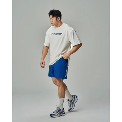 TEAMJOINED JOINED® ADAPT LOGO SPLICING PERFORMANCE SHORTS-BLUE