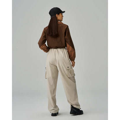 TEAMJOINED JOINED® INVICTUS WOMEN POCKET WINDBREAKER TOP-BROWN