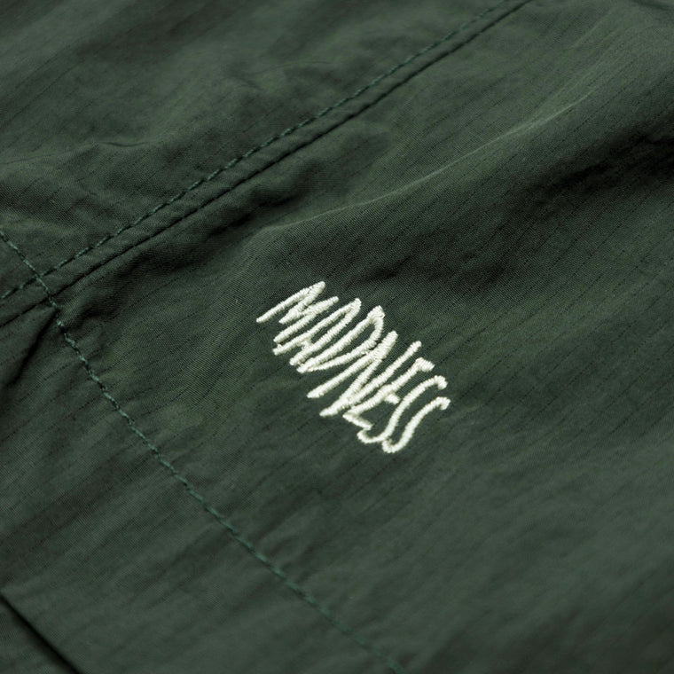 MADNESS LOGO TECH SHORTS 15"-DARK GREEN