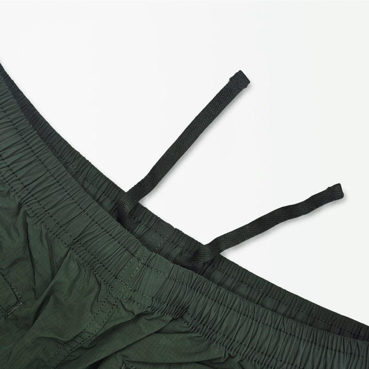 MADNESS LOGO TECH SHORTS 15"-DARK GREEN