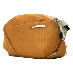 NIID NIID NEO CHEST BAG / NEOSHIELD FABRIC-AMBER ORANGE