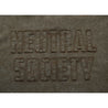 NEUTRAL SOCIETY SNOW WASH LOGO POLO SHIRT-BROWN