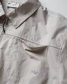 NINE POINT NINE SPIRAL LASER COACH JACKET-IVORY