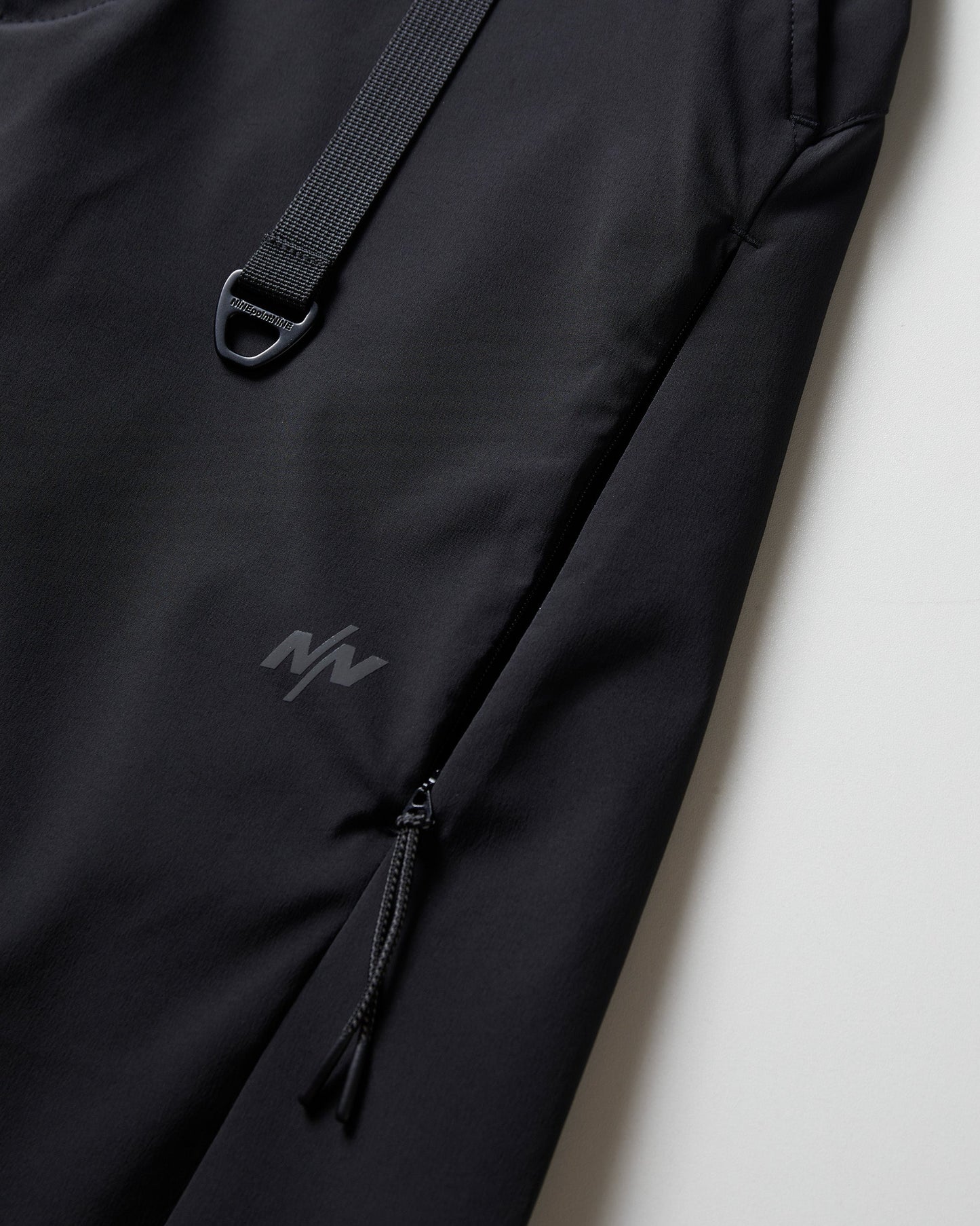 NINE POINT NINE THE SUN SHELL PANTS-BLACK