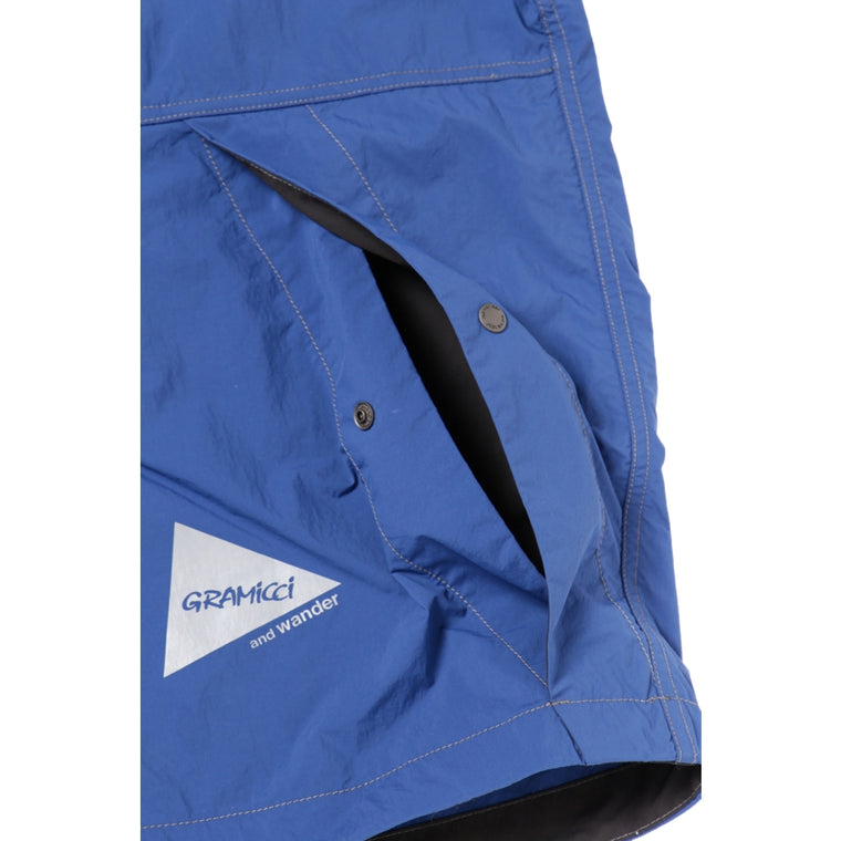 AND WANDER X GRAMICCI BRUSHED NYLON JACKET-BLUE