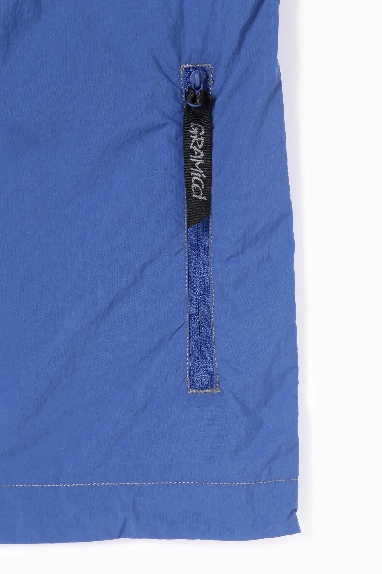 AND WANDER X GRAMICCI BRUSHED NYLON VEST-BLUE