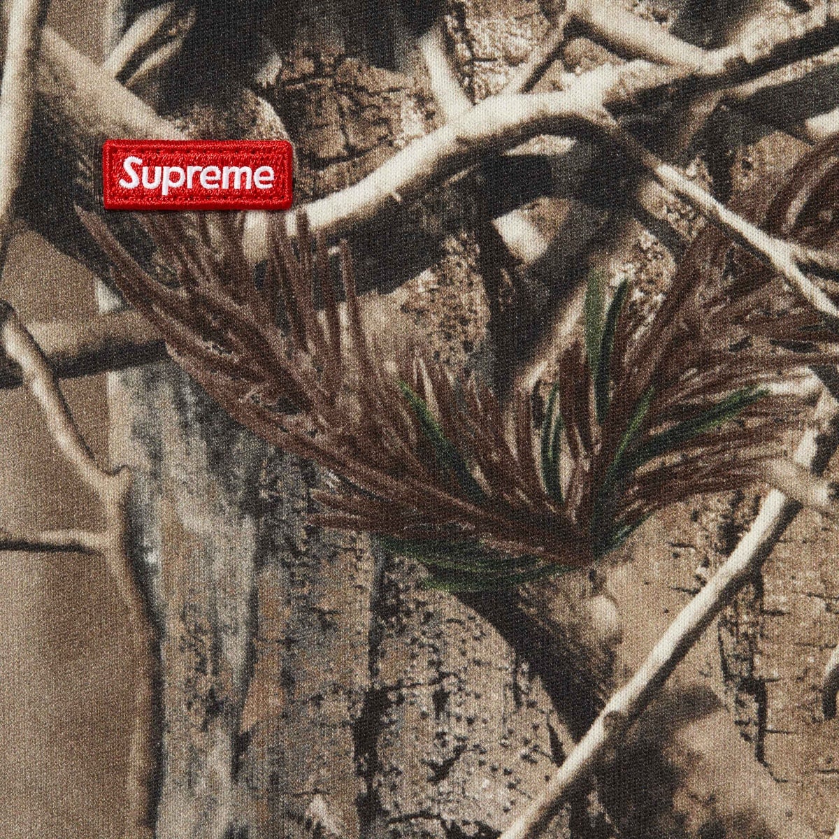 SUPREME SMALL BOX L/S TEE-REALTREE® AP CAMO