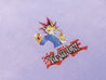 SCENE BY ICE FIRE X YU-GI—OH_MUTO YUHI WASHED TEE-PURPLE